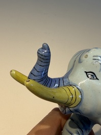 A pair of blue, white and yellow Frankfurt faience models of elephants, ca. 1700