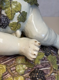 A massive polychrome Brussels faience 'Bacchus on a Barrel' fountain, 18th C.