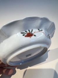 Three sets of Chinese famille verte cups and saucers with birds and flowers, various marks, Kangxi