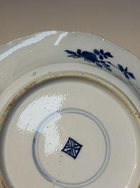 Four Chinese blue and white moulded plates with floral design, Kangxi