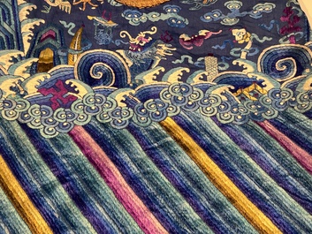 A Chinese blue-ground embroidered silk 'Dragon' robe, 'Ji Fu' 吉服, 19th C.