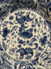 Four Chinese blue and white moulded plates with floral design, Kangxi