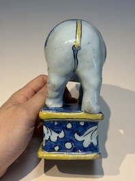 A pair of blue, white and yellow Frankfurt faience models of elephants, ca. 1700