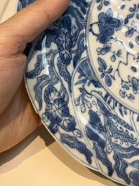 Four Chinese blue and white moulded plates with floral design, Kangxi