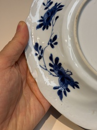 Four Chinese blue and white moulded plates with floral design, Kangxi