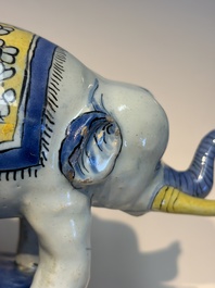 A pair of blue, white and yellow Frankfurt faience models of elephants, ca. 1700