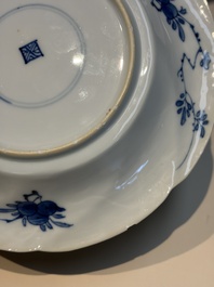 Four Chinese blue and white moulded plates with floral design, Kangxi