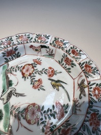 Three sets of Chinese famille verte cups and saucers with birds and flowers, various marks, Kangxi