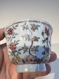 Three sets of Chinese famille verte cups and saucers with birds and flowers, various marks, Kangxi