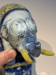 A pair of blue, white and yellow Frankfurt faience models of elephants, ca. 1700