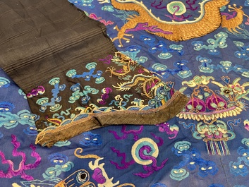 A Chinese blue-ground embroidered silk 'Dragon' robe, 'Ji Fu' 吉服, 19th C.