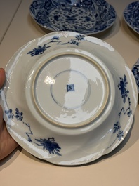 Four Chinese blue and white moulded plates with floral design, Kangxi