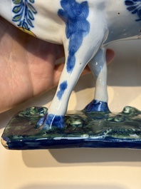 A pair of polychrome Dutch Delft cows, 18th C.