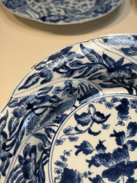 Four Chinese blue and white moulded plates with floral design, Kangxi