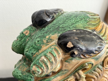 A large Chinese sancai-glazed pottery 'Buddhist Lion' roof tile, Ming
