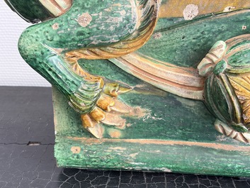 A large Chinese sancai-glazed pottery 'Buddhist Lion' roof tile, Ming