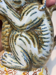 A pair of polychrome Dutch Delft monkey ewers and covers, 18th C.