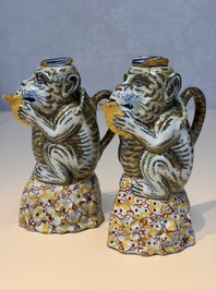 A pair of polychrome Dutch Delft monkey ewers and covers, 18th C.
