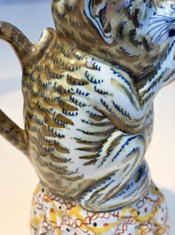 A pair of polychrome Dutch Delft monkey ewers and covers, 18th C.