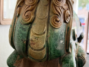 A large Chinese sancai-glazed pottery 'Buddhist Lion' roof tile, Ming
