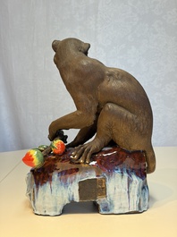 A Chinese polychrome-glazed Shiwan stoneware 'Monkey and Peach' group, signed, 20th C.