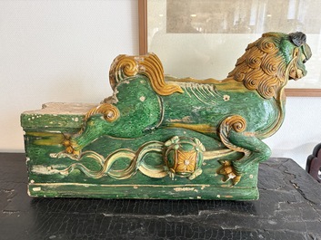 A large Chinese sancai-glazed pottery 'Buddhist Lion' roof tile, Ming
