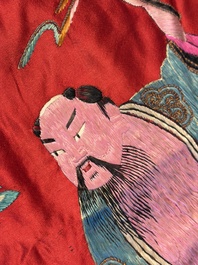 An extremely large Chinese red-ground embroidered silk 'Sanxing and Eight Immortals' panel, 19th C.