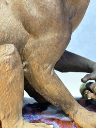 A Chinese polychrome-glazed Shiwan stoneware 'Monkey and Peach' group, signed, 20th C.