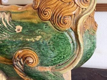 A large Chinese sancai-glazed pottery 'Buddhist Lion' roof tile, Ming