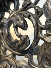 Two large Chinese carved wooden stands, 19th C.