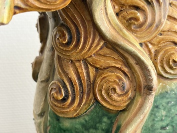 A large Chinese sancai-glazed pottery 'Buddhist Lion' roof tile, Ming
