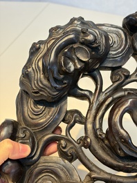 Two large Chinese carved wooden stands, 19th C.