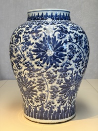 A large Chinese blue and white 'Lotus Scroll' baluster vase with later gilt-bronze lamp mounts, Kangxi