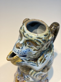 A pair of polychrome Dutch Delft monkey ewers and covers, 18th C.
