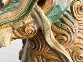 A large Chinese sancai-glazed pottery 'Buddhist Lion' roof tile, Ming