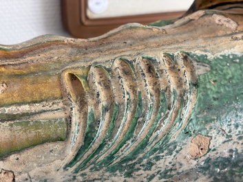 A large Chinese sancai-glazed pottery 'Buddhist Lion' roof tile, Ming