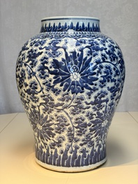 A large Chinese blue and white 'Lotus Scroll' baluster vase with later gilt-bronze lamp mounts, Kangxi