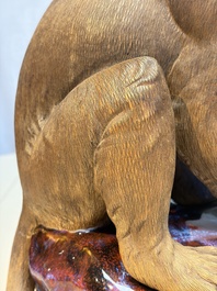 A Chinese polychrome-glazed Shiwan stoneware 'Monkey and Peach' group, signed, 20th C.