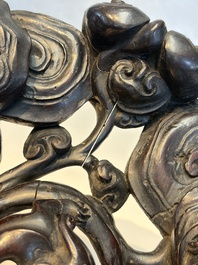 Two large Chinese carved wooden stands, 19th C.
