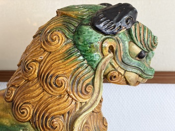 A large Chinese sancai-glazed pottery 'Buddhist Lion' roof tile, Ming