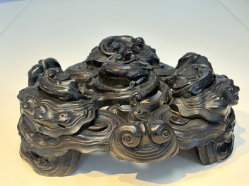 Two large Chinese carved wooden stands, 19th C.