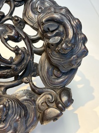 Two large Chinese carved wooden stands, 19th C.