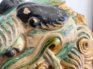 A large Chinese sancai-glazed pottery 'Buddhist Lion' roof tile, Ming