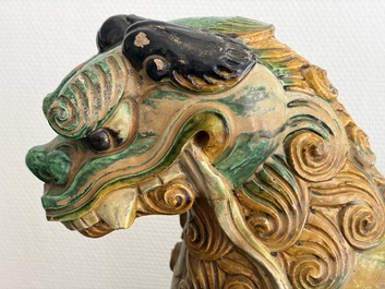 A large Chinese sancai-glazed pottery 'Buddhist Lion' roof tile, Ming