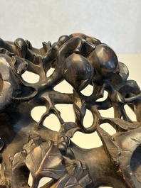 Two large Chinese carved wooden stands, 19th C.