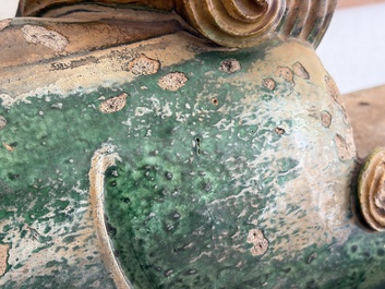 A large Chinese sancai-glazed pottery 'Buddhist Lion' roof tile, Ming