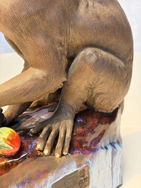 A Chinese polychrome-glazed Shiwan stoneware 'Monkey and Peach' group, signed, 20th C.