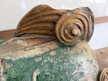 A large Chinese sancai-glazed pottery 'Buddhist Lion' roof tile, Ming
