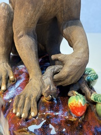 A Chinese polychrome-glazed Shiwan stoneware 'Monkey and Peach' group, signed, 20th C.