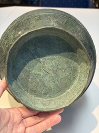 An extremely rare Chinese archaic bronze wine vessel, 'Hu 壺', Warring States period